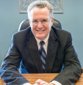 Matthew Davis at desk