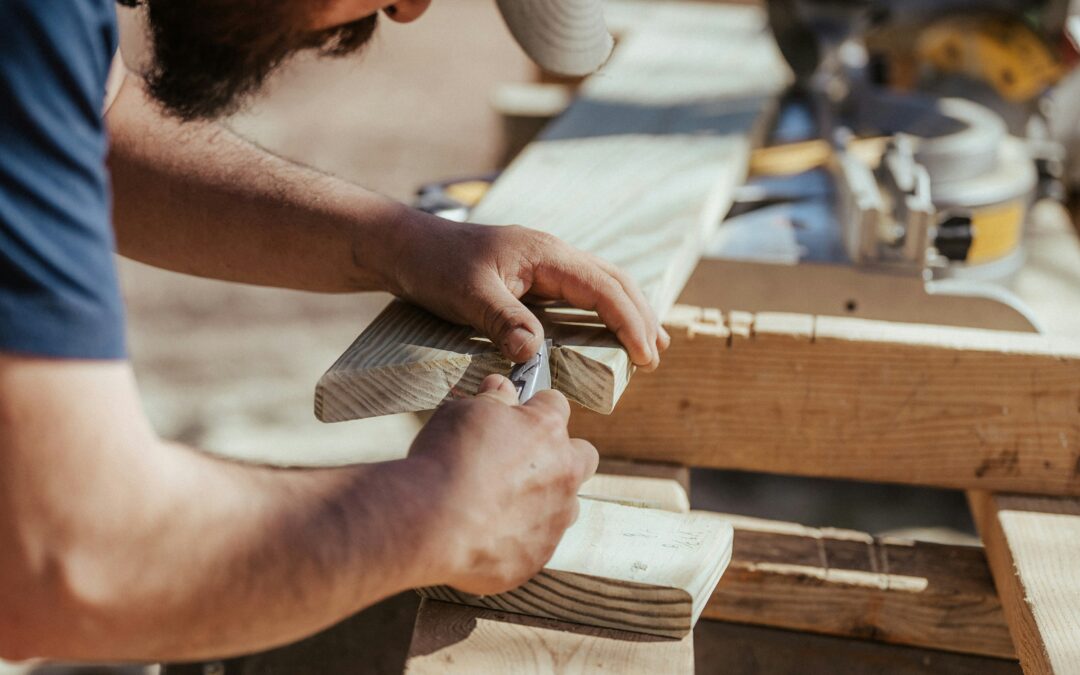 A man working on a piece of wood